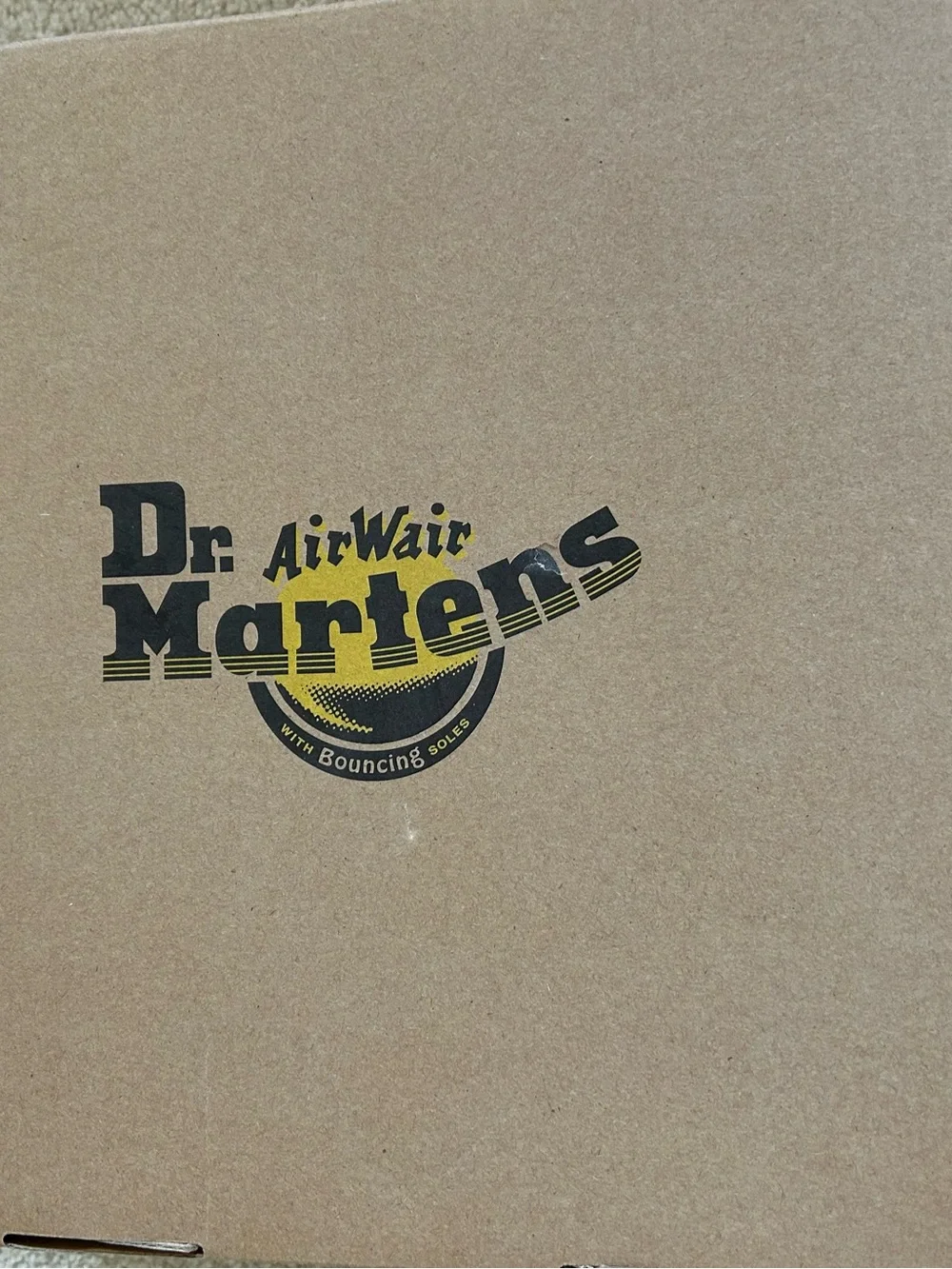 Dr. Martens Black Smooth Leather Platform Lace-Up Boots with Yellow Stitching